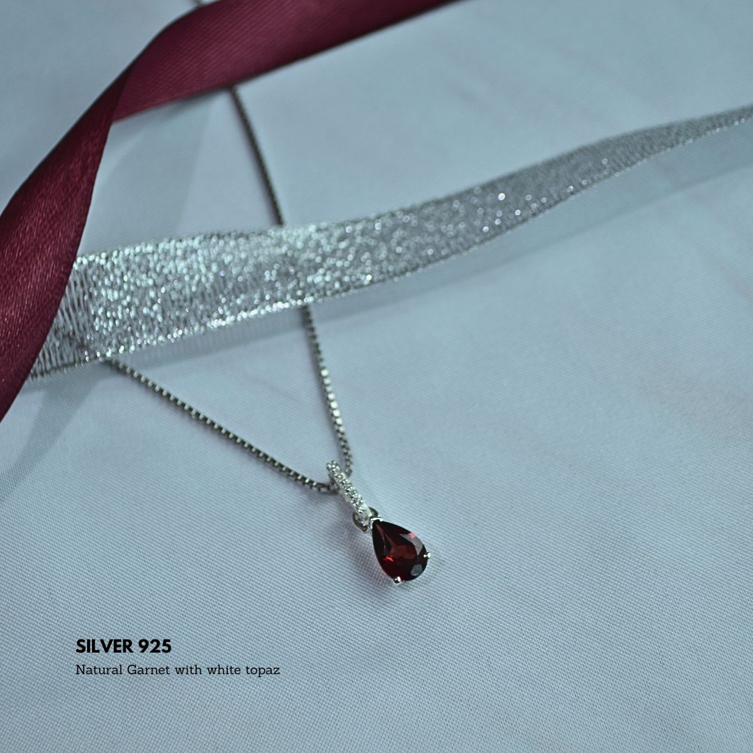 Twilight Spark Garnet Pendant with Topaz Accents
