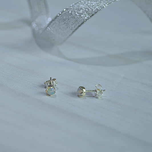 Opal Glow Stud Earrings in Sterling Silver