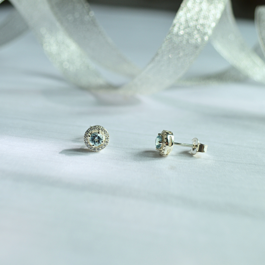 Blue Topaz Halo Stud Earrings in 925 Silver