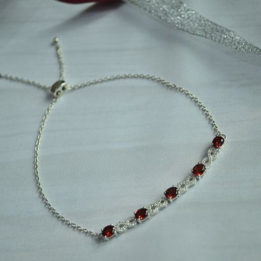 Infinity Garnet & White Topaz Bracelet in 925 Silver