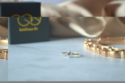 Gold ring with blue stone