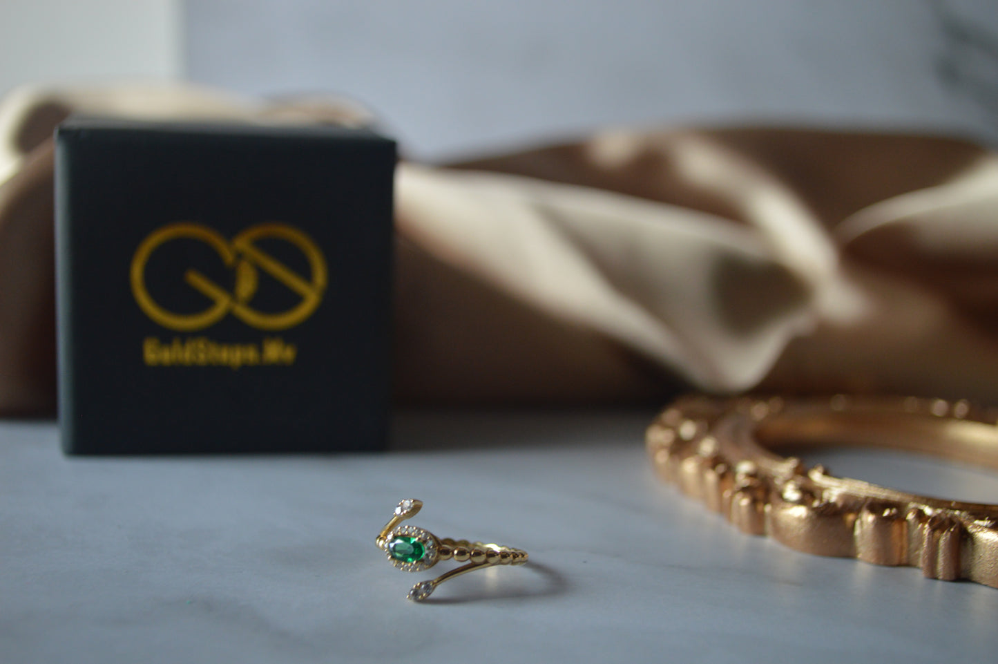 Original gold ring green stones